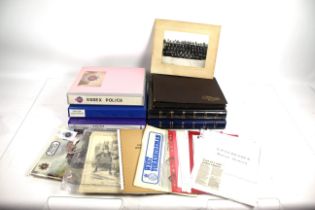 A large box containing several folders of police ephemera such as post-cards, photographs and
