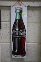 A Coca-Cola advertising sign, approx. 21" x 6½"