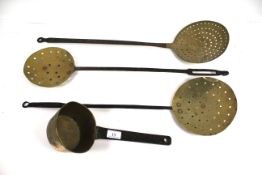 Three 18th Century iron handled brass skimmers and