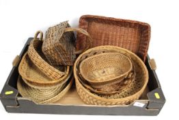 A quantity of various vintage wicker trays and bas
