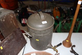 A vintage metal ware urn with brass tap