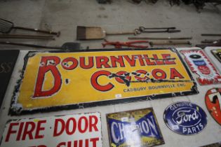 An enamel advertising sign for "Bournville Cocoa",