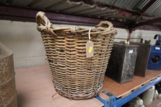 A wicker two handled basket