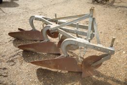Ferguson 3 furrow plough. With spacers, discs and skimmers. Sold new by LE Tuckwell, Worlingworth.