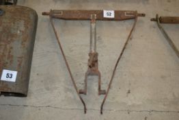 Farm-made T-bar and drop arms.