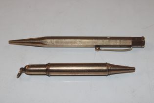 An Asprey 9ct gold cased propelling pencil; and a