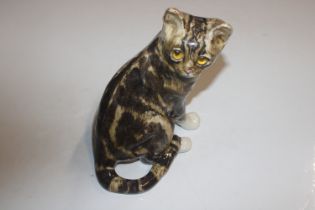 A Winstanley pottery model of cat with glass eyes