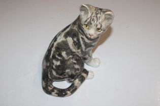 A Winstanley pottery model of cat with glass eyes