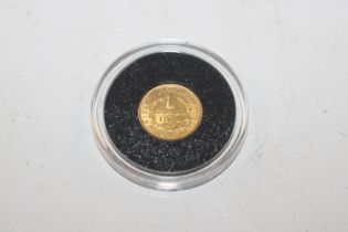 An 1851 gold $1 coin