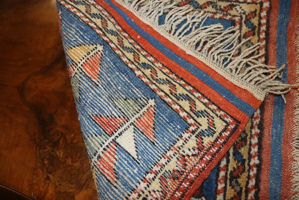 A patterned wool rug, approx. 1'10" x 2' - Image 2 of 2