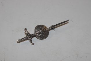 A vintage Sterling silver kilt pin in the form of