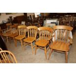 A set of six beech spindle back kitchen chairs com