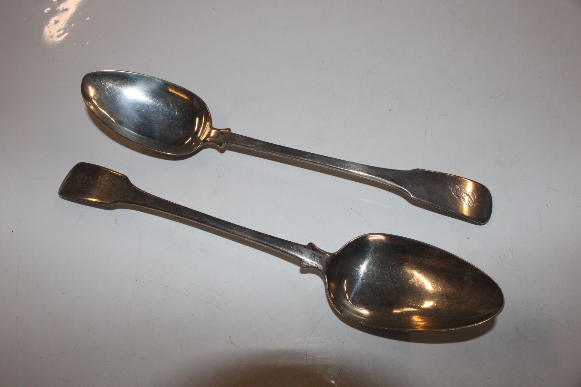 Two Scottish silver serving spoons, approx. 132gms