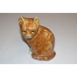 A Winstanley pottery model of cat with glass eyes