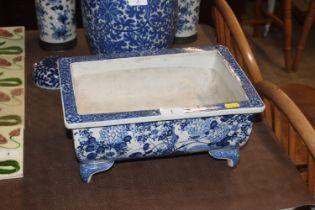 An Oriental blue and white Bonsai bowl or jardiniè