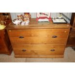 A large pine two drawer chest