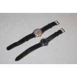A Timex wrist watch and a Medana calendar automati