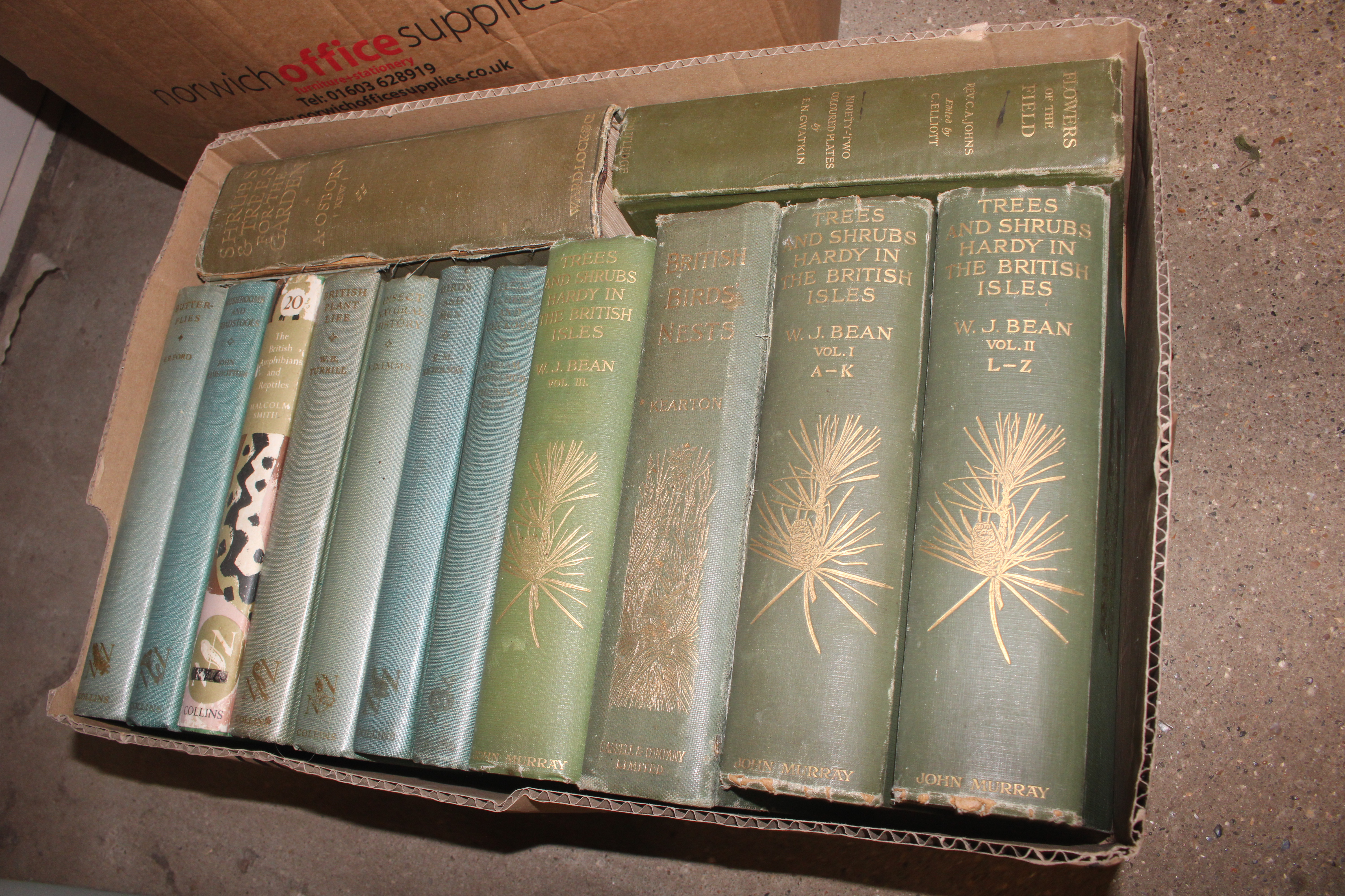 A box of books including Shrubs and Trees for the
