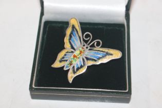 A large Sterling silver and enamel brooch in the f