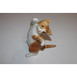 A Winstanley pottery model of cat with glass eyes