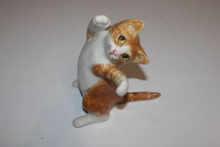 A Winstanley pottery model of cat with glass eyes