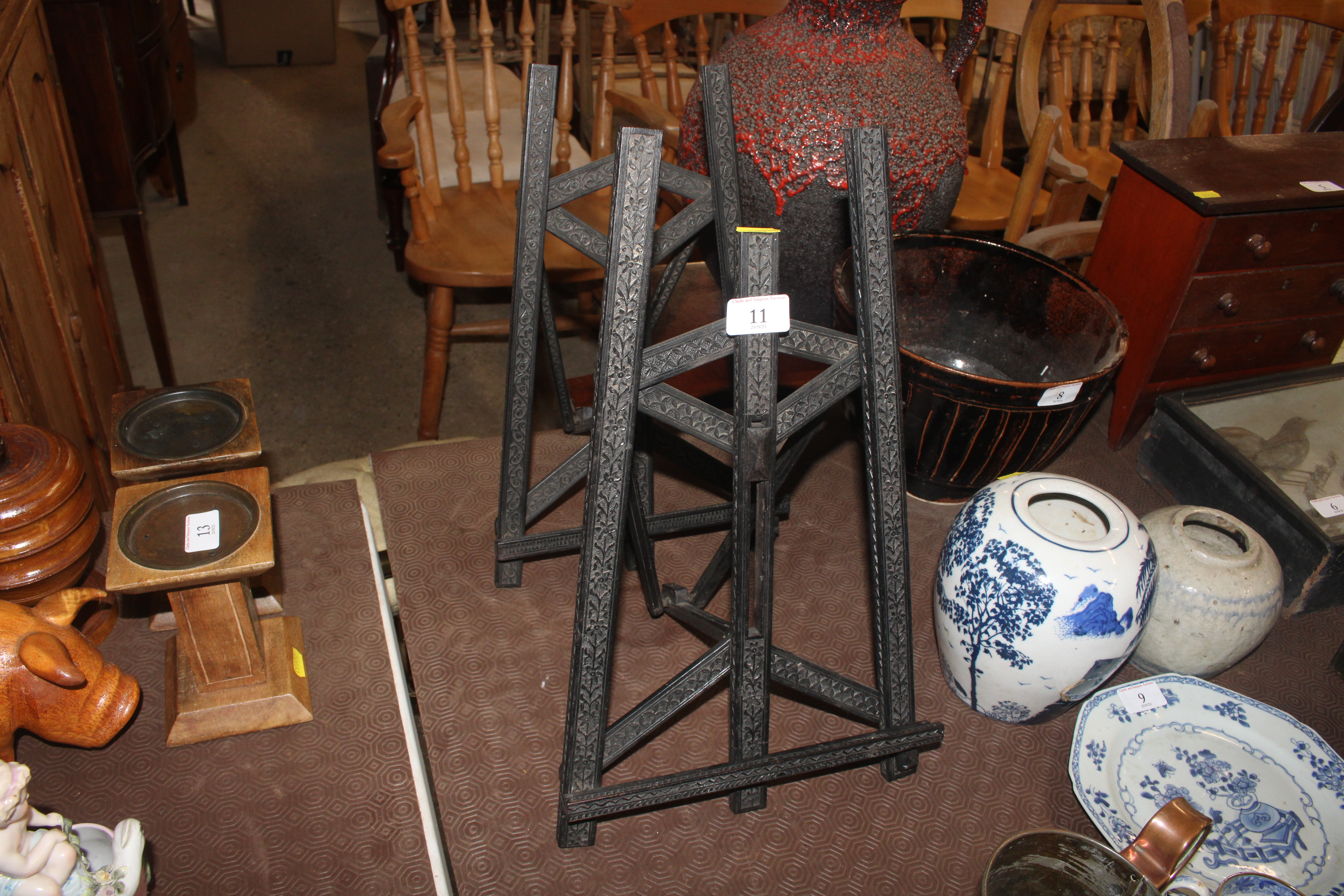 Two carved ebony music stands