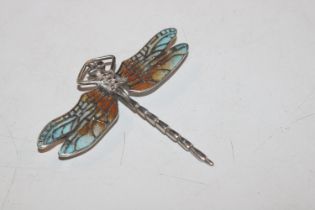 A large Sterling silver and enamelled brooch in th