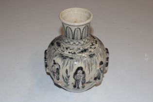 An Oriental crackle glazed vase with applied figur