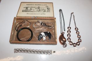 A cigar box and contents of costume jewellery