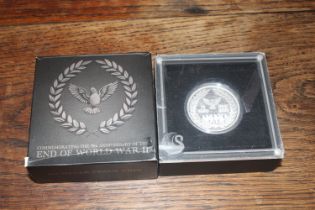 A 1oz silver proof coin commemorating the 75th Ann