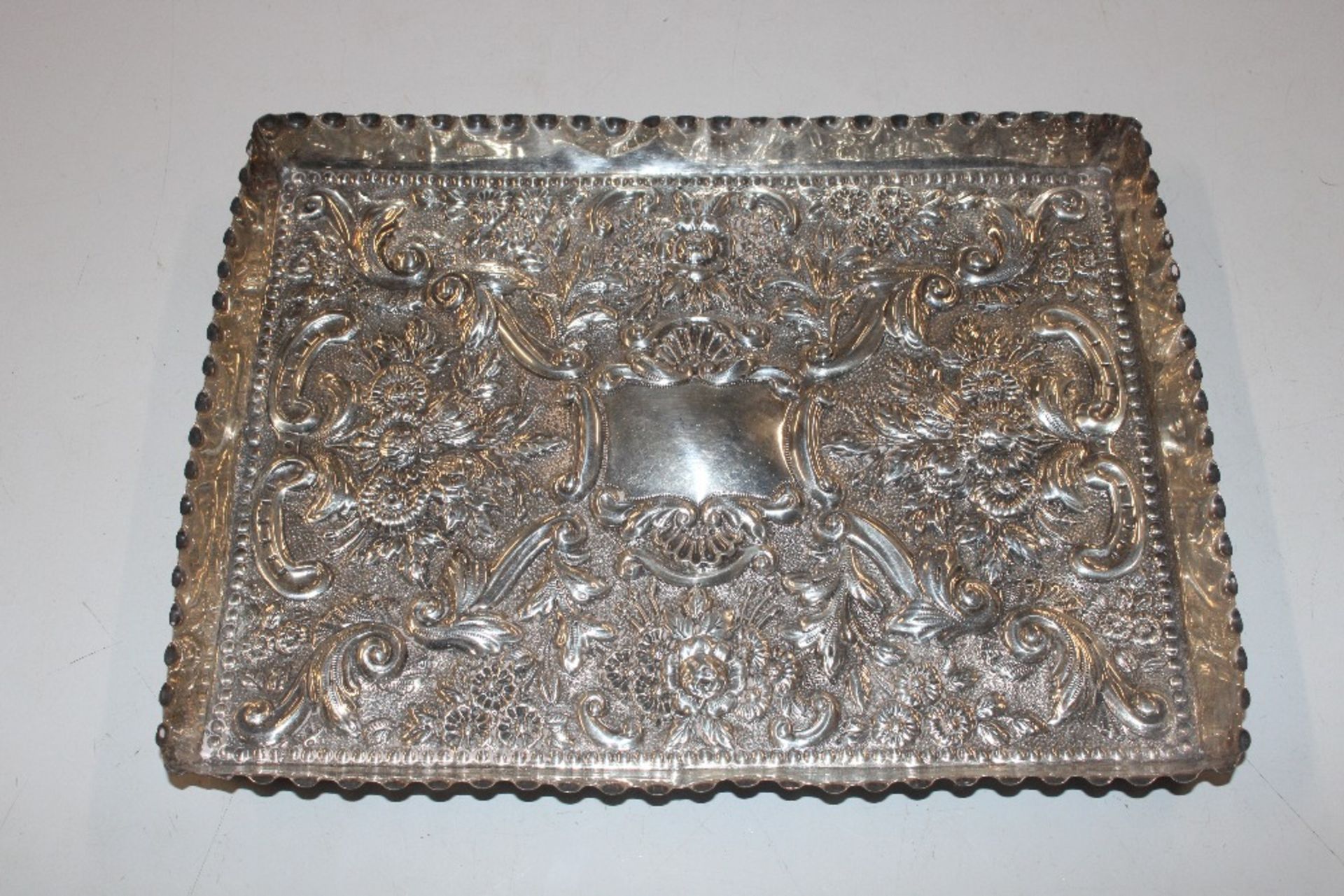 A Birmingham silver tray with floral decoration, a