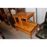 A pine table and two similar pine occasional tables