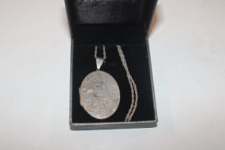 A large vintage Hallmarked Sterling silver locket