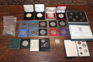 A box containing coinage and bank notes, a gilt £5