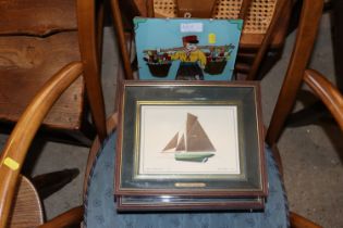 Four boat pictures together with a glass panel