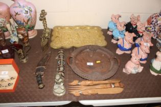 A collection of Eastern wooden and metal ware incl