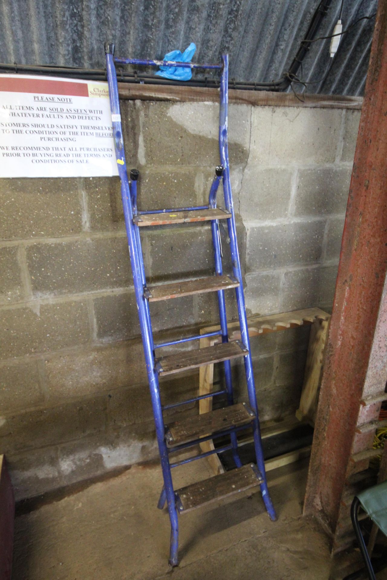 A set of folding metal steps