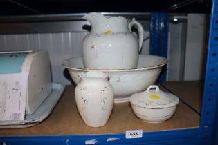 A wash jug and bowl set including toothbrush holde