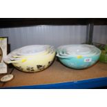 Two graduated sets of Pyrex bowls