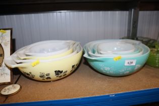 Two graduated sets of Pyrex bowls