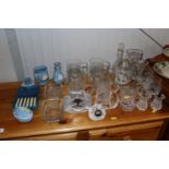 A collection of table glassware including tankards