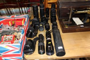 A collection of various cameras lenses