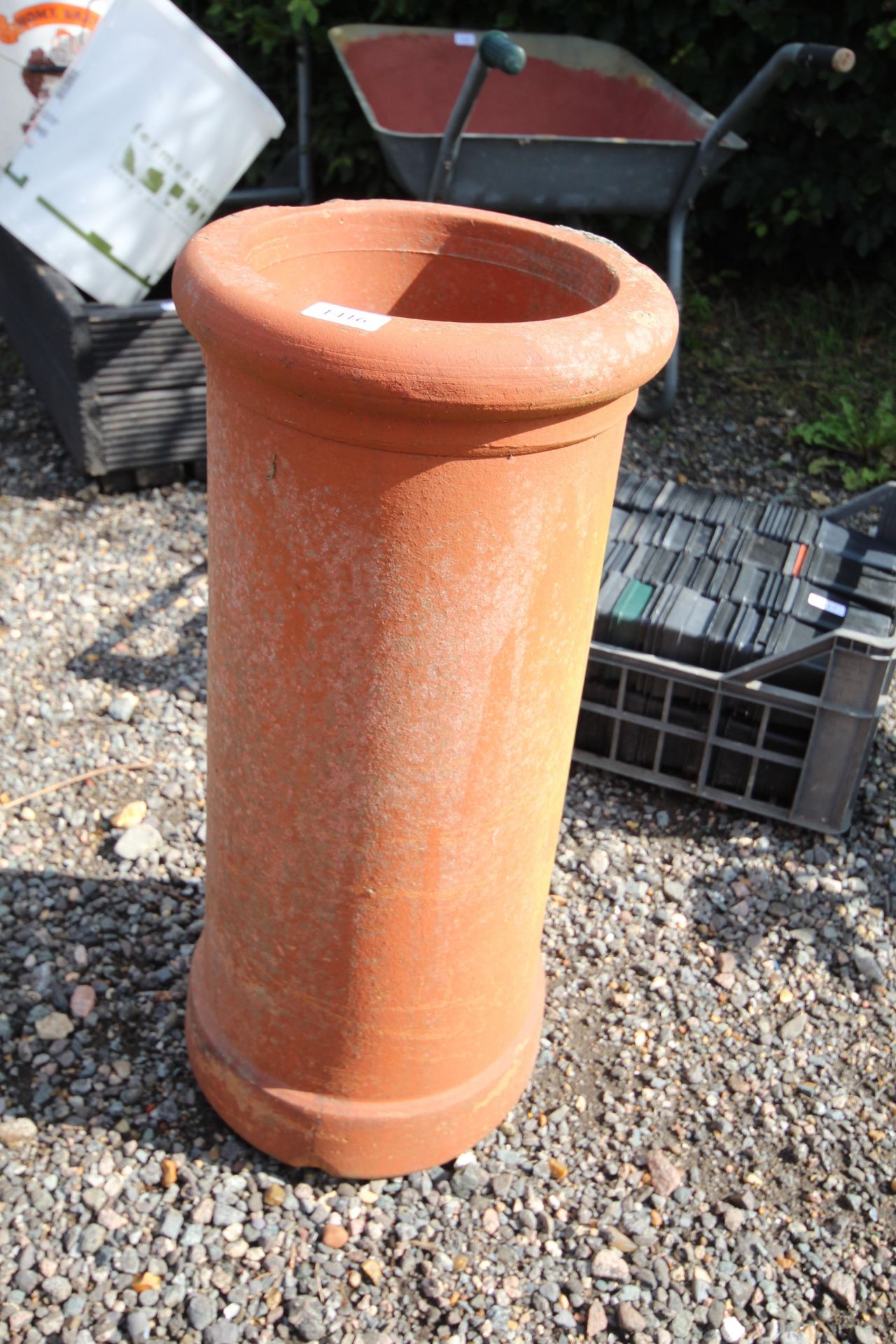 A terracotta chimney pot