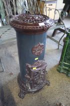 An antique Godin enamelled stove approx. 31" in he