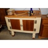 A painted and decorated Art Deco style sideboard