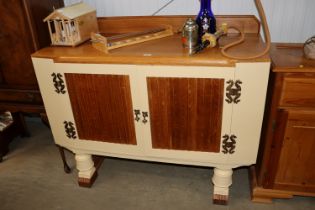 A painted and decorated Art Deco style sideboard