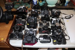 A collection of various vintage cameras including