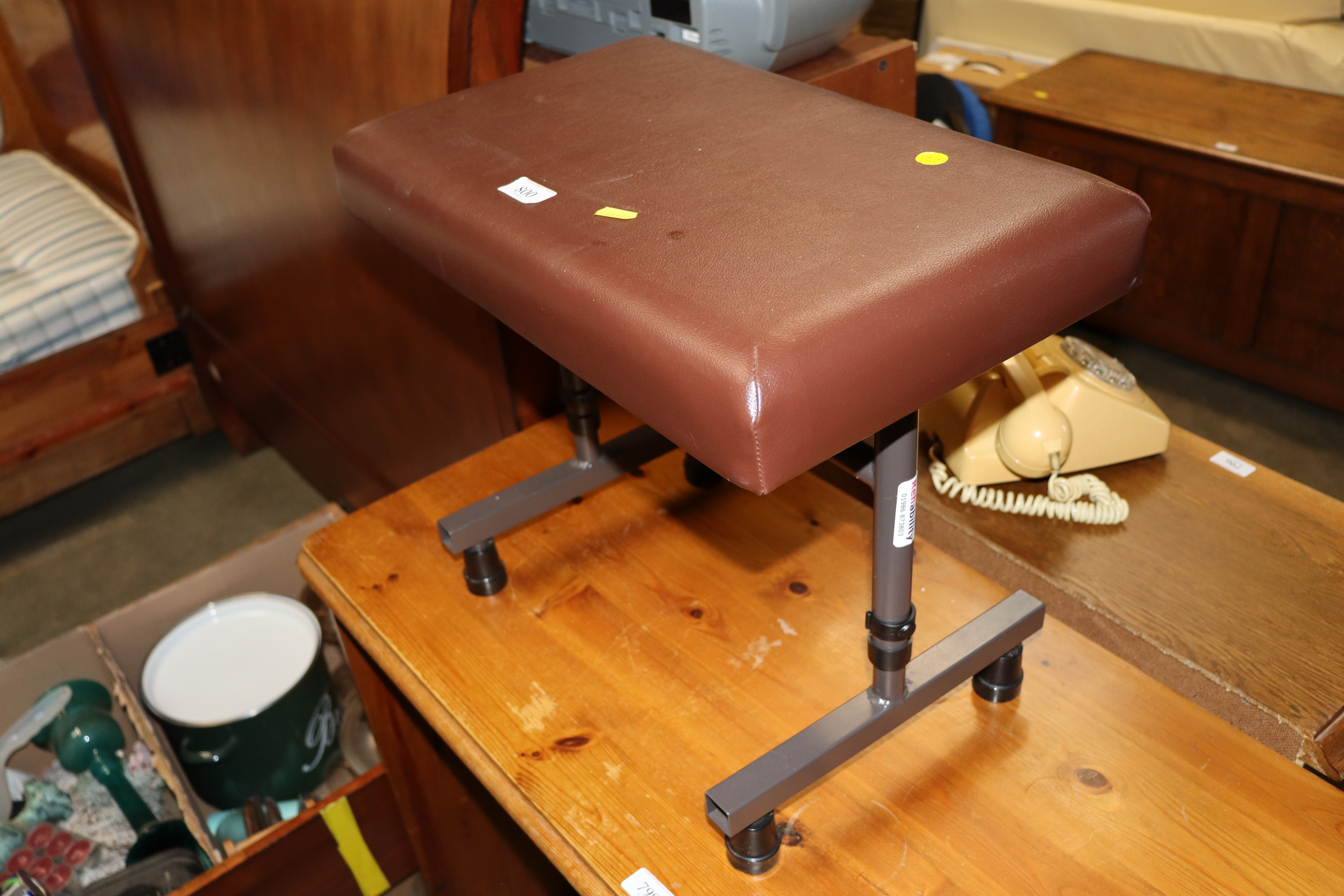 An adjustable stool