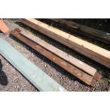 Four lengths of cut timber