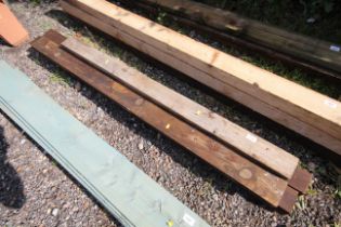 Four lengths of cut timber